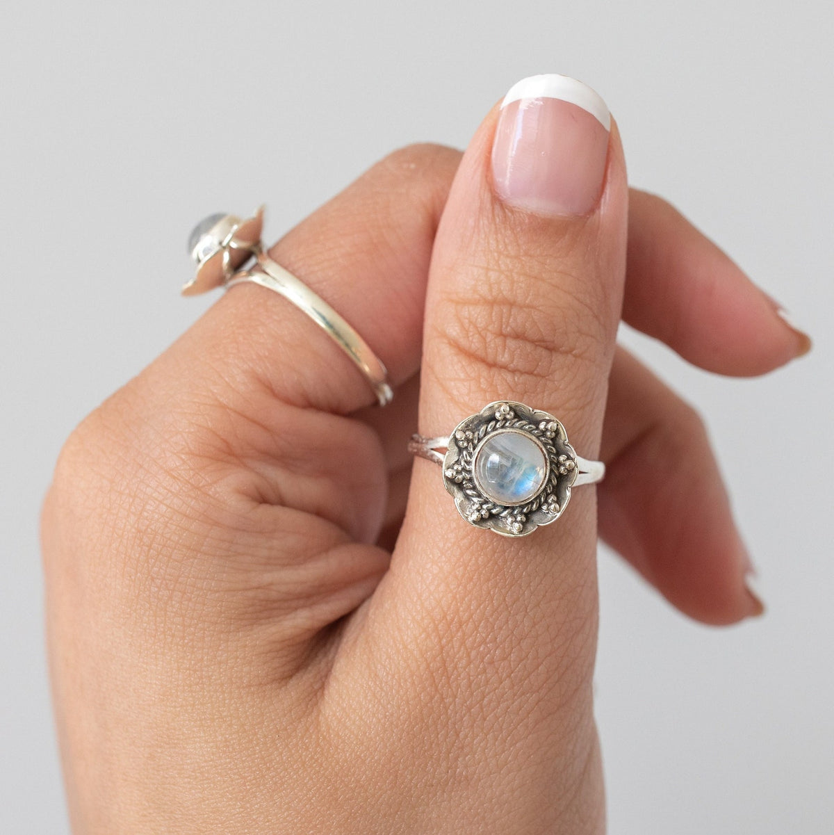 Round Rainbow Moonstone Botanical Ring in Sterling Silver