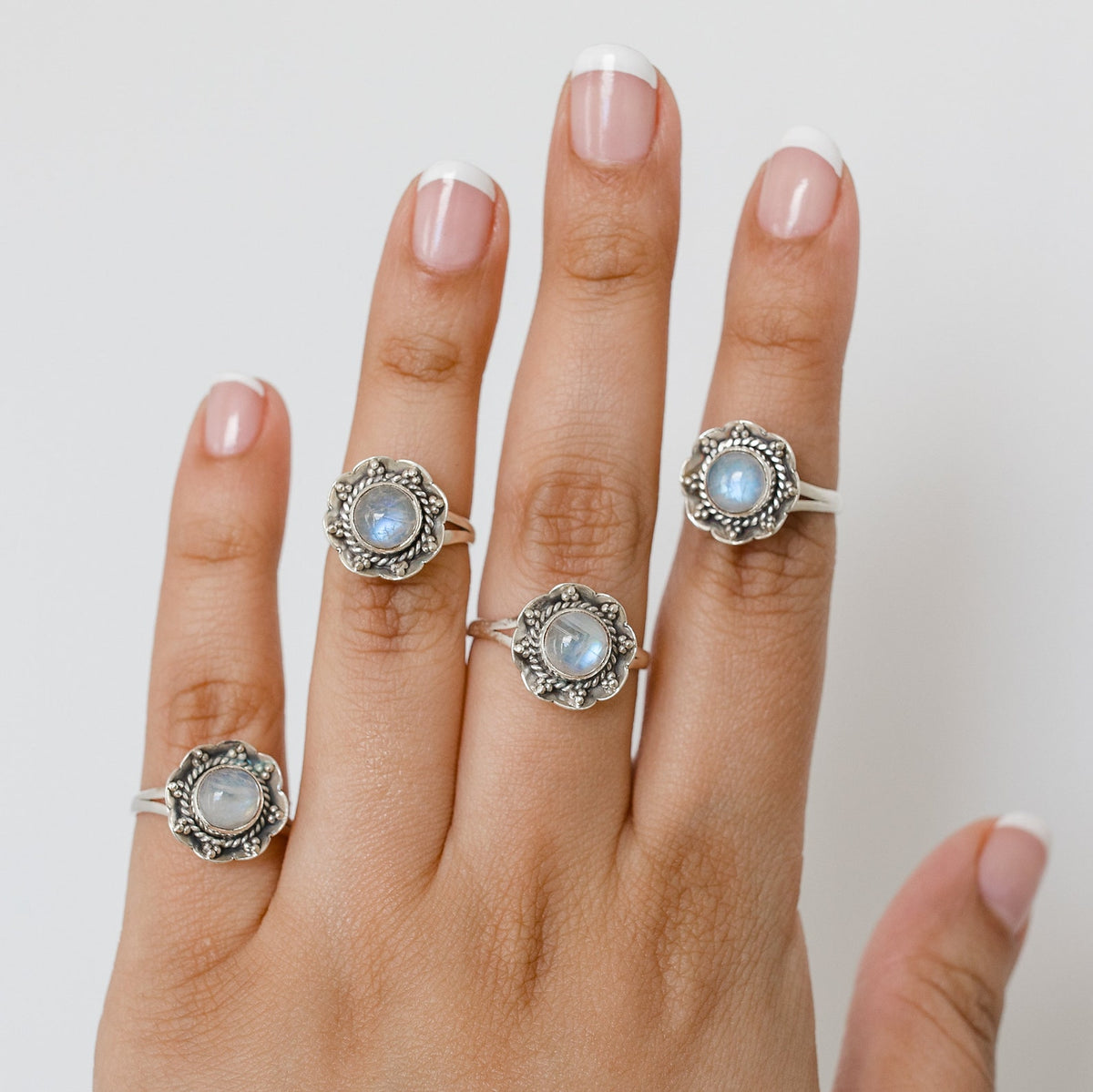 Round Rainbow Moonstone Botanical Ring in Sterling Silver